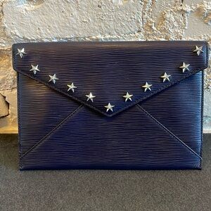 Rebecca Minkoff Navy leather clutch with silver star studs. Approx. 7”x10.5”